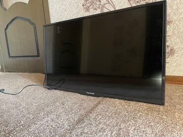 скупка старых нерабочих телевизоров: Телевизор POLARLINE, диагональ примерно 32–40". Тонкие рамки — 2