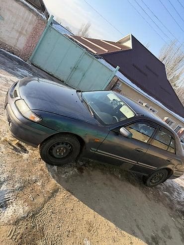 Продажа авто: Mazda 626: 1997 г., 1.8 л, Механика, Бензин, Седан — 2
