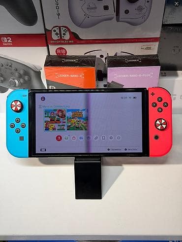 nitendo switch: Nintendo Switch OLED (модель с неоновыми Joy‑Con) Комплектация: - — 1