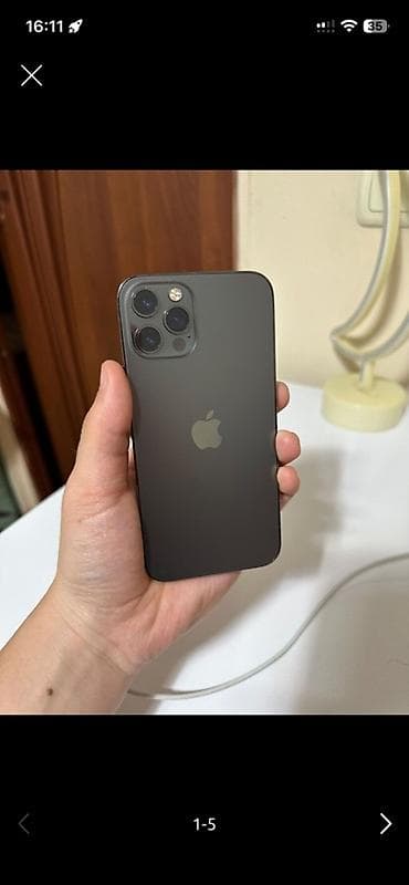 аефон 12: IPhone 12 Pro, 256 ГБ, Графит, 79 % — 1