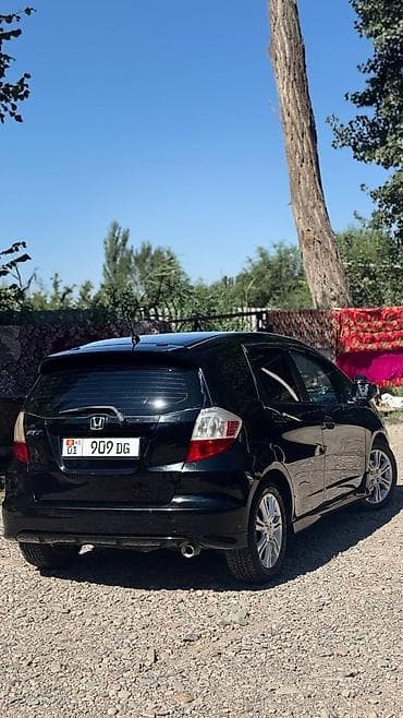 outback wilderness: Honda Fit: 2010 г., 1.5 л, Автомат, Бензин, Хэтчбэк — 5