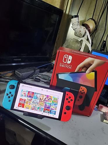 Nintendo Switch OLED: Nintendo switch oled чипованный(прошитый) в идеальном состоянии полный — 1