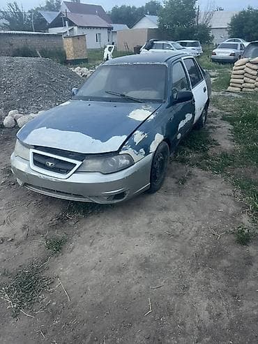 Daewoo Nexia: 2004 г., 1.5 л, Механика, Бензин, Седан