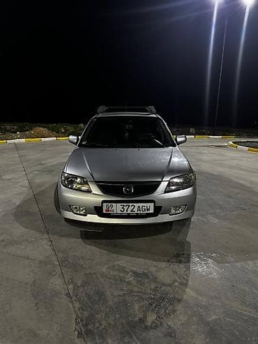 Mazda 323: 2003 г., 1.6 л, Ручные, Бензин, Универсал