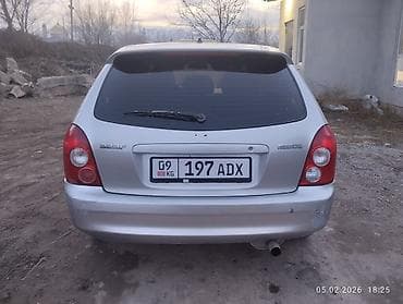 forester 2003: Mazda 323: 2003 г., 1.6 л, Механика, Бензин, Хэтчбэк — 5
