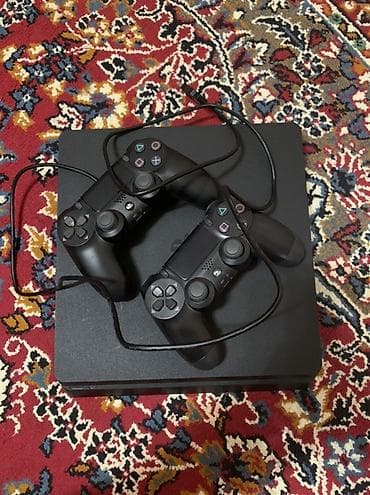 PlayStation 4 Slim (чёрная) Комплектация: - Консоль PS4 Slim - 2