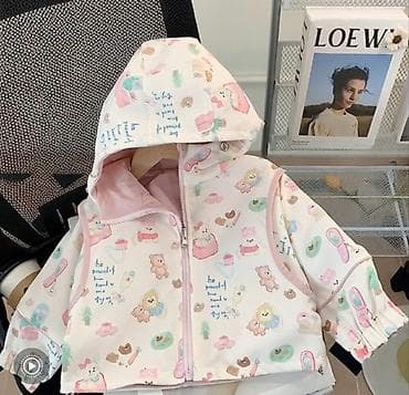 Детская двусторонняя ветровка с капюшоном. на рост 80 см . новая at lalafo.kg Детская двусторонняя ветровка с капюшоном. на рост 80 см . новая