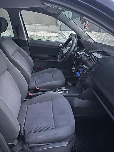 porsche caene: Volkswagen Polo: 2004 г., 1.4 л, Автомат, Бензин, Хэтчбэк — 6