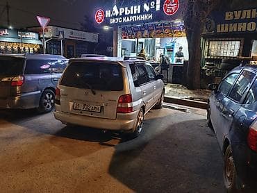 matiz diska: Mazda Demio: 1999 г., 1.4 л, Автомат, Бензин, Универсал — 5