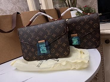шопперы цена: Сумка Louis Vuitton Pochette Métis Monogram Модель выполнена из — 9