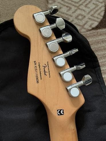 Музыкальные инструменты: - Электрогитара Squier by Fender в стиле Stratocaster, цвет Candy — 7