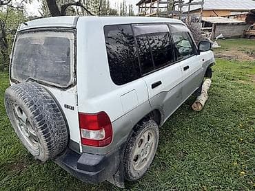 Mitsubishi Pajero iO: 1998 г., Внедорожник