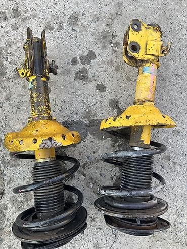 Автохимия: Передний амортизатор Subaru Б/у, Оригинал — 1