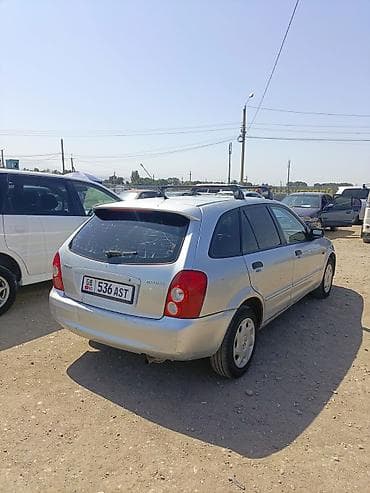 выбор номера о: Mazda 323: 2002 г., Механика, Бензин, Универсал — 4