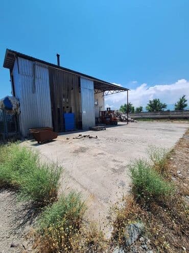 продажа участки и домов бишкек: 56 соток Продаю в г Кара - Балте участок со складскими помещениями по — 4