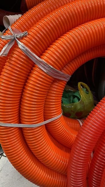 Гофрированная ПНД труба оранжевого цвета (электротехническая) -