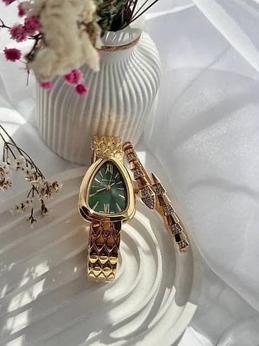 золото брослет: Женские часы в золотистом тоне с фирменным «змеиным» браслетом - — 1