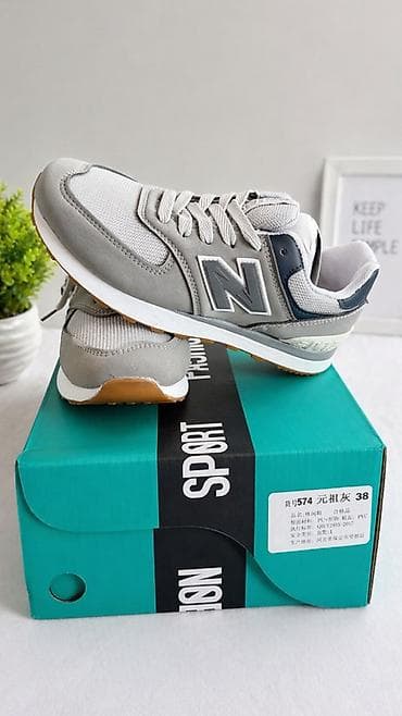 nike plus: Кроссовки серые, модель 574 (размер на коробке: 38) написано 38 но на — 1