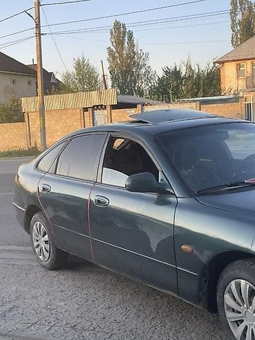step 2: Mazda 626: 1992 г., 2 л, Механика, Бензин, Седан — 2