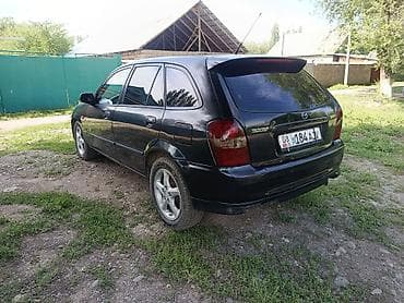моторчик печки 124: Mazda 323: 2001 г., 2 л, Механика, Бензин, Хэтчбэк — 6