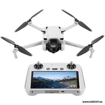 параплан купить: DJI Mini 3 + пульт DJI RC (с экраном) — комплект для аэрофото и видео — 1