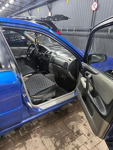 mazda 3: Mazda 323: 2001 г., 1.6 л, Механика, Бензин, Хэтчбэк — 7
