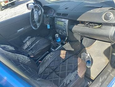 daewoo nex: Mazda Demio: 2003 г., Механика, Бензин, Хэтчбэк — 2