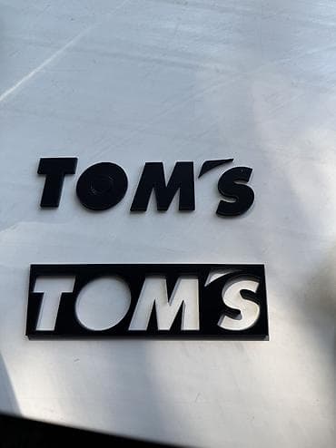 Унаа: Шильдик TOM’S 
Шильдик тюнинг ателье томс тойота 
Toms toyota racing — 1