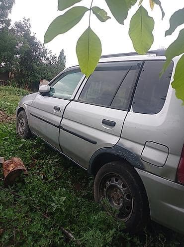 сктер: Mazda Demio: 1998 г., 1.3 л, Автомат, Бензин, Универсал — 4