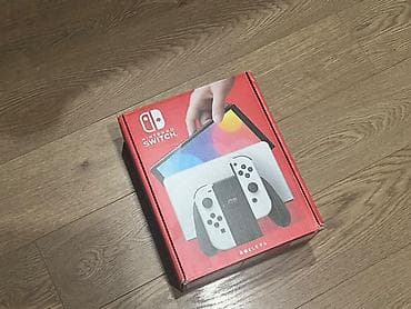 Nintendo Switch OLED: Nintendo Switch OLED (модель HEG-001) — белая версия Комплектация по — 7