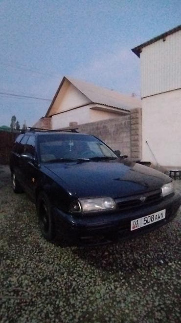 саната нюрас: Nissan Primera: 1996 г., 2 л, Механика, Бензин, Универсал — 1