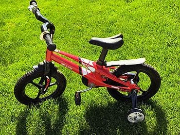 Детский велосипед Skillmax с дополнительными боковыми колесами