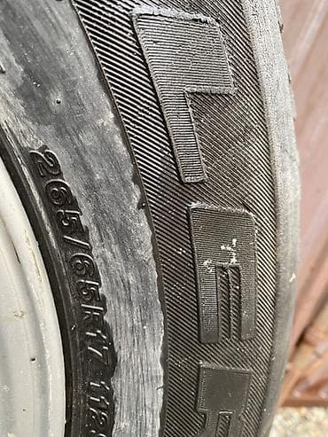 Литой диск с шиной Bridgestone Dueler - Размер шины: 265/65 R17 — 2