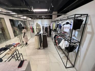 оборудование в бутик: Стеллажи для бутика одежды Кронштейны для бутика одежды Торговое — 7