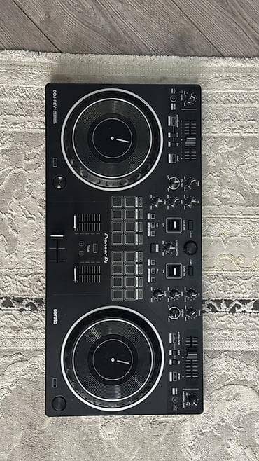 Аудиотехника: DJ-контроллер Pioneer DJ DDJ‑REV1 + транспортировочный рюкзак и кабели — 2