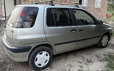 Toyota Raum: 2000 г., 1.5 л, Бензин — 6