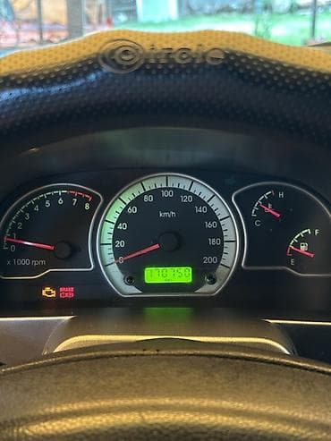 7 мест 3 ряда сидений: Daewoo Gentra / Chevrolet Lacetti — салон и оснащение - Руль с — 3