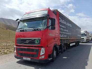 ящик фура: Тягач, Volvo, 2010 г., Шторный — 1