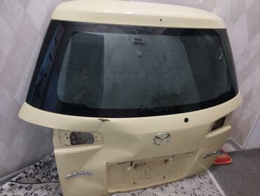 Автокосметика: Стекло багажника от Мазда демио — 1