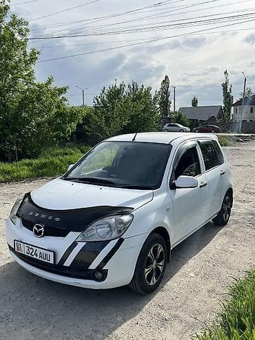 Mazda Demio: 2006 г., 1.3 л, Автомат, Бензин, Хэтчбэк