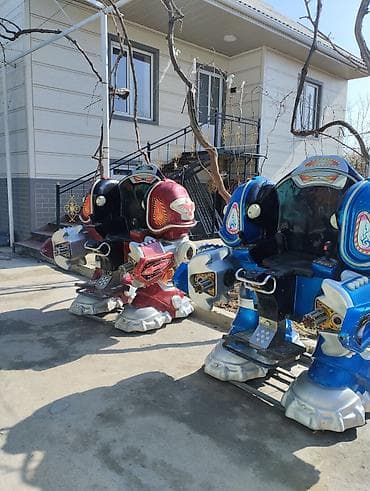 Готовый бизнес: Детские электромобили-аттракционы «роботы» (2 шт.) - Формат: сидячие — 2