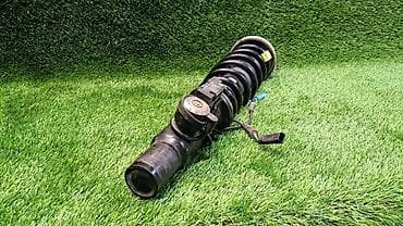 е70 e70: Передний амортизатор BMW 2009 г., Б/у, Оригинал — 2