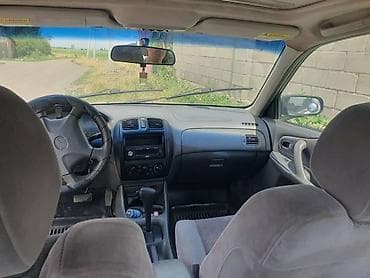 Mazda Protege: 1999 г., 1.8 л, Автомат, Седан — 4
