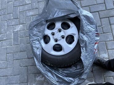 один диск от бмв: Колеса в сборе 175 / 70 / R 13, Зима, Комплект, Легковые, Железные, отверстий - 4 — 1