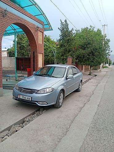 машина чанган фото цена: Легковой автомобиль седан, светло‑голубой цвет кузова. Передний — 3