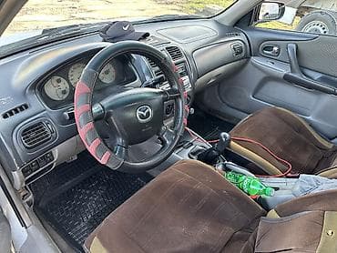 handa jazz: Mazda 323: 2002 г., 1.6 л, Механика, Бензин, Седан — 6