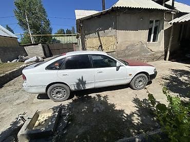 Транспорт: Mazda 626: 1992 г., 2 л, Механика, Бензин, Лифтбек — 1