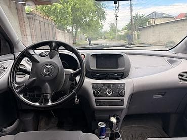 китайский минивэн купить: Nissan Almera Tino: 2004 г., 1.8 л, Механика, Минивэн — 4