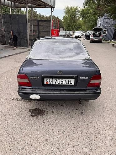 морнинг диска: Nissan Sunny: 1993 г., 1.6 л, Механика, Бензин, Седан — 6