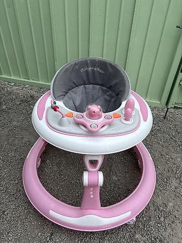 Детские ходунки Babywalker, розово-белые почти новые, пользовались 1 — 2